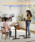 Two users utilizing Yihayo Electric Height Adjustable Overbed Table W/ Wheels, 24x16 Inch Mobile Nursing Stand Desk for laptop and painting.