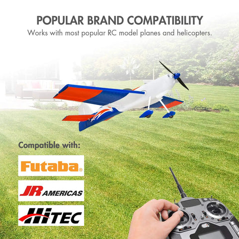 Model airplane flying with Two Pack 2000mAh NiMH RC Receiver Battery With Hitec Connector, 6V, compatible with popular brands.