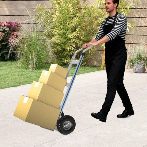 Built Tough Heavy Duty Aluminum Hand Truck With Smooth Rolling Rubber Wheels 500 Pound Max Capacity Furniture Moving Helper Dolly being used outdoors.
