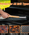Person using Grill Brush And Scraper 2 In 1 For BBQ With Durable Replaceable Stainless Steel Head And Wooden Handle Built For Backyard Grills Heavy Grease Cleanup Quick Barbecue Accessories on barbecue grill