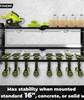 Power Tool Organizer With Built In Charging Station And Eight Outlet Power Strip Workhorse Large Wall Mount Drill Holder Heavy Duty Metal Tool Rack For Garage Organization Black with tools mounted on it against a concrete wall.