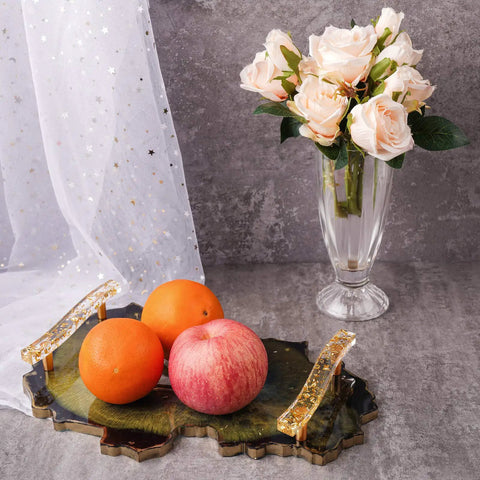 Top Shelf Four Pair Epoxy Resin Silicone Molds For Custom Bar Pull Handles And Cabinet Hardware DIY fruit tray with orange and apple.