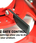 Close-up of adjustable gate trigger on Chest Mounted Grass Seed And Fertilizer Spreader with Easy Fill Hopper 35 Pound Capacity.