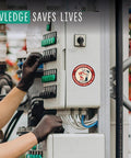 Electric panel with Remember Kids Electricity Will Kill You Vinyl Sticker on control box, emphasizing safety message.