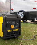 6500-Watt RV Ready Portable Inverter Generator With Quiet Technology beside an RV on grass.