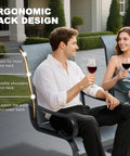 Set Of Two Padded Textilene Patio Dining Chairs With C Spring Rocker Action and Curved Armrests Rock Solid Powder Coated Metal Frame with ergonomic back design.