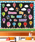 Dream Big Bulletin Board Set 66 Pieces With Hot Air Balloons Cloud Borders 3D Honeycombs Kites And Sky Themed Decor For First Day Of School Classroom Decoration featuring colorful hot air balloons and kites on a classroom wall.