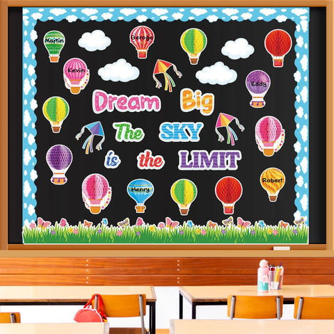 Dream Big Bulletin Board Set 66 Pieces With Hot Air Balloons Cloud Borders 3D Honeycombs Kites And Sky Themed Decor For First Day Of School Classroom Decoration featuring colorful hot air balloons and kites on a classroom wall.
