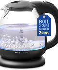 Fast Boil 1 Liter Glass Electric Kettle Cordless 360 Degree Base BPA Free 1100W With Auto Shutoff Blue LED Interior Black in use