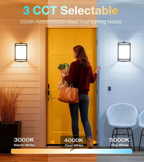 Woman approaches yellow door lit by Two Pack Dusk To Dawn LED Outdoor Wall Sconce With Adjustable 3000K 4000K 5000K Color Temperature