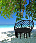 Macrame Hammock Chair Swing With Cushioned Seat And Hardware Kit For Indoor Outdoor Chill on a beach