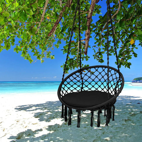 Macrame Hammock Chair Swing With Cushioned Seat And Hardware Kit For Indoor Outdoor Chill on a beach