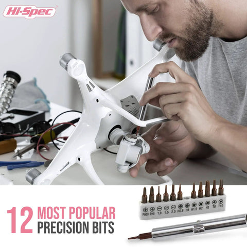 Person using precision bits and screwdriver on a drone, showing the Hi-Spec 12 most popular precision bits set.