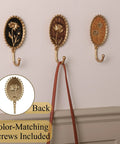 Super Clean Set Of Three Straight Up Vintage Wall Hooks With French Garden Floral Details And Classic Scalloped Metallic Hardware For Entryway Organizing And Cozy Bedroom Vibes, showcasing floral designs and hooks.