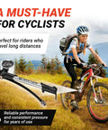Cyclist in terrain with High Pressure Bike Shock Pump With Gauge For MTB Full Suspension 300 PSI 20 Bar Portable Manual Air Pump