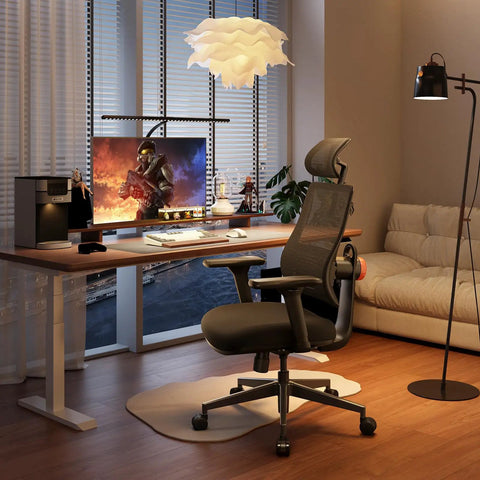 Ergonomic Office Chair With Auto Following Lumbar Support next to a desk setup with a computer and lamp in a cozy room