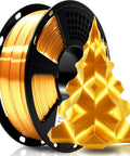 Geeetech Silk PLA filament spool, 1.75 mm, metallic gold silk, 1 kg, on black spool with gold sculpture