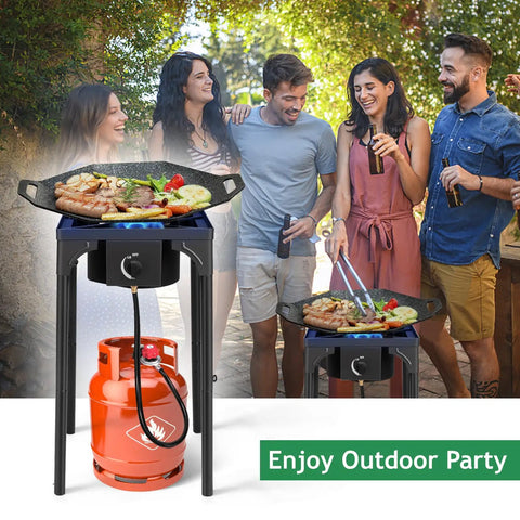 Group cooking on Beefy 75,000 BTU Dual Burner Portable Gas Camp Stove with 20 PSI regulator during outdoor party