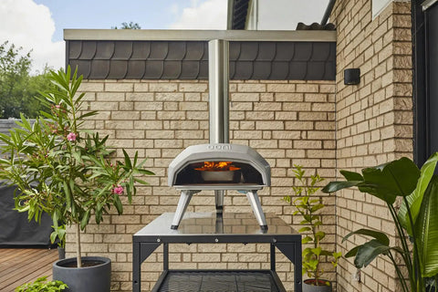 Karu 12 Multi Fuel Outdoor Portable Pizza Oven Delivers 950 F Heat For Wood Or Propane Cooks 12 Inch Pizzas In 60 Seconds