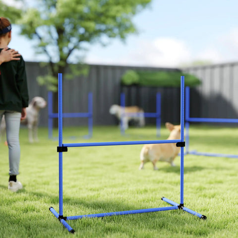 4 Piece Dog Agility Jump Set With Adjustable Heights on grass, featuring durable PVC poles and non-slip feet for backyard training.