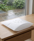 100 Piece Foam Pouches For Fragile Dishes And Glassware, Double Sided Cushioning Sleeves Protect Cups Mugs And Bowls During Moving, Shipping Or Storage, 11.8 Inch Square Foam Wraps For Breakable Tableware. White EPE foam pouch on wooden table near window.