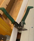 Right Upright Aviation Snips For Tin And Sheet Metal With Forged Blades And Kush N Power Comfort Grips in use on wood panel.