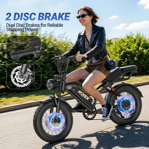 Woman riding All Terrain 1500W Electric Fat Tire Bike for Adults with Brushless Motor Ebike, 20 Inch Wheels, Dual Suspension