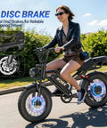 Woman riding Powerful 1500W Fat Tire Electric Bike For Adults With Dual Suspension on road with disc brakes
