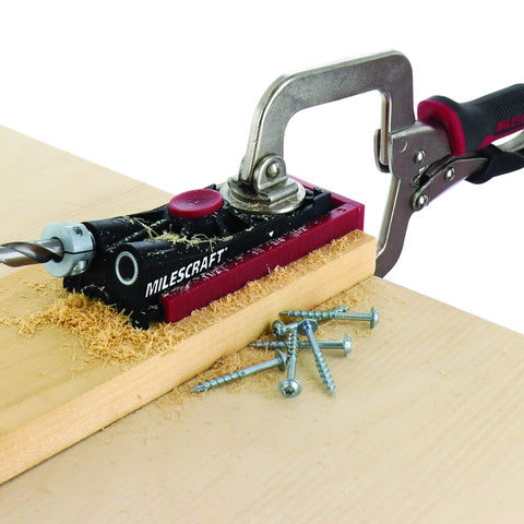 Premium Pocket Hole Jig Bundle With Double Barrel And Single Barrel Jigs, 2 Inch Face Clamp, Imperial And Metric Scales in use on wood