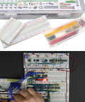All In One 2300 Piece DIY Electronics Component Kit with ICs, PCBs; hands arranging wires on a breadboard