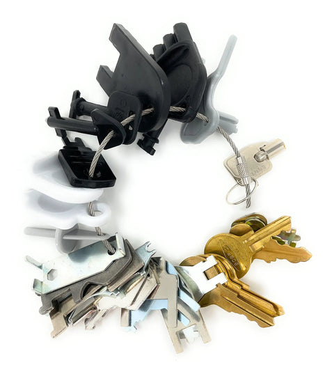 Master Dispenser Key Ring Set With 27 Common Paper Towel And Toilet Paper Keys for janitors, shown with metal and plastic keys.