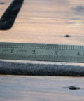Calf Hair Recurve Bow Limb Dampeners 2 Pack For Quiet Release And Smoother Shots next to ruler for size reference