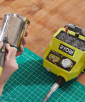 Badass 18 Volt Cordless Mini Rotary Tool With 35 Premium Accessories For Ultra Fast Diy Engraving Polishing And Precision Sanding Projects in use for engraving on a metal mug.