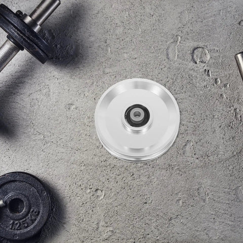 Aluminum Alloy Fitness Pulley With Quiet Operation And Heavy Duty Bearing on concrete surface, 551lb load capacity shown