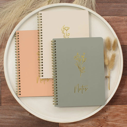 Stylish Aesthetic Spiral Notebook Set Of 3 For Women With Cute College Ruled 8x6 Journals displayed on a wooden table.