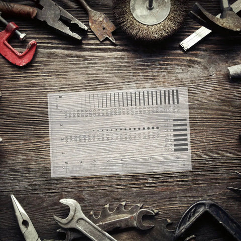 High Precision Measuring Ruler for Crack Width and Diameter Defect Detection in Work Sites on wooden table with tools