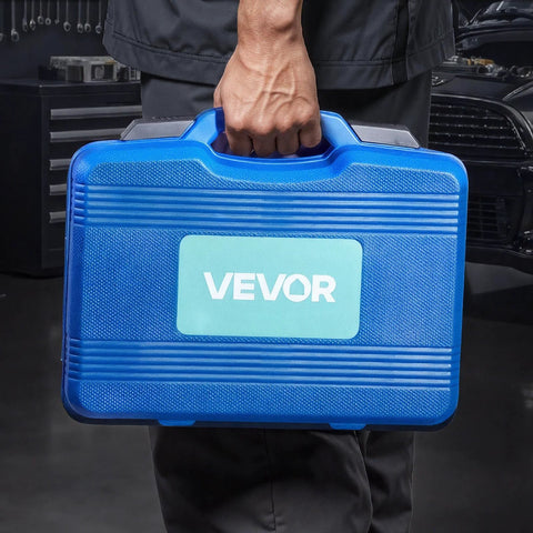 Person holding blue carrying case for 52 Piece Custom Bushing Bearing And Seal Driver Set And 14 Piece Bearing Puller Kit in workshop