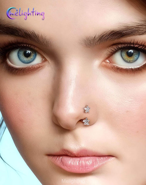 Close-up of a person wearing a flower push pin 20G horseshoe nose ring hoop, 316L surgical steel, septum piercing.