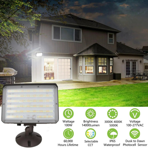 Dusk To Dawn Outdoor 100W LED Flood Light With Knuckle Mount illuminating a residential area with 14000 lumens