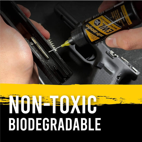 Applying EWL30 Buddy Pack Extra Thick Synthetic CLP Lubricant with metal needle tip to firearm slide, 1 oz bottle