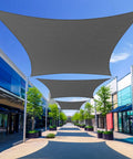 Dark Grey Sun Shade Sail 10x14 Rectangle Canopy For Patio And Backyard, HDPE 185GSM Fabric Blocks Up To 95 Percent UV installed outdoors.