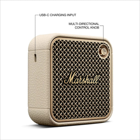Willen II Portable Bluetooth Speaker With Rugged Waterproof And Dustproof Build, Loud Stereo Sound And Beefy Bass, Compact Wireless Design For Travel And Outdoors Cream Finish shown from side angle with USB-C charging input and control knob visible.