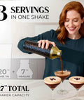 Top Shelf Insulated Cocktail Shaker Set With Double Wall Stainless Steel Body And Integrated Jigger Strainer For Smooth Home Bar Pouring And Easy Party Mixing With Total Zero Condensation Drama In Slick Gold Finish being used to pour cocktails.