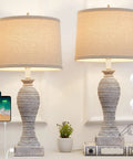 Lit 27-Inch Table Lamps For Living Room Set Of 2 Farmhouse Touch Lamps with USB ports, bulbs included, on nightstand.