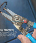 Snap Ring Pliers 927 Pro Grade For Internal And External Circlips Five Tip Set shown in use with blue grips.