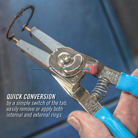 Snap Ring Pliers 927 Pro Grade For Internal And External Circlips Five Tip Set shown in use with blue grips.