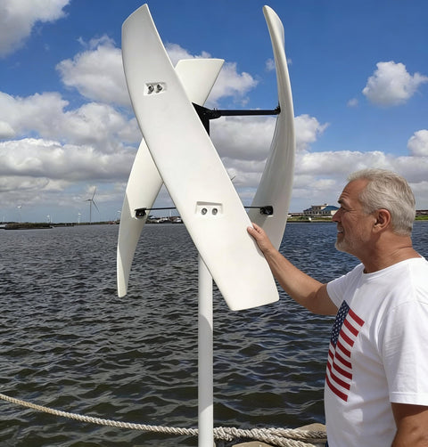 800W Vertical Axis Wind Turbine Kit With MPPT Controller For 12V 24V 48V Systems installed near water, showing curved blade design