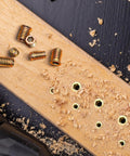 Heavy Duty Carbon Steel Threaded Wood Insert Kit 151 Piece M6 M8 M10 Screw In Set With Hex Wrenches on wooden surface with shavings.