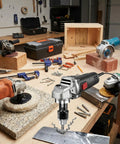 Top Shelf 3 Piece Angle Grinder Thread Adapter Set Swaps Five Eighth Inch 11 threads for M10 M14 on a workshop table with tools.