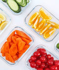 Ten Pack 22 Oz Glass Meal Prep Containers With Lids Durable Borosilicate Glass For Fresh Meal Prep Microwave Oven Freezer And Dishwasher Safe Easy Stackable Lunch Storage Portion Control Gray filled with sliced fruits and vegetables